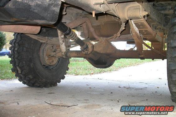 dscn3090.jpg Cut off rear shock mounts and clocked them up so they don't hang 3" under the axle.  Getting those rock anchors off the axle makes a huge difference off road.