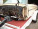 1964 Ford Galaxie - This 1964 Ford Galaxie is missing its engine and front clip, resting on a trailer.