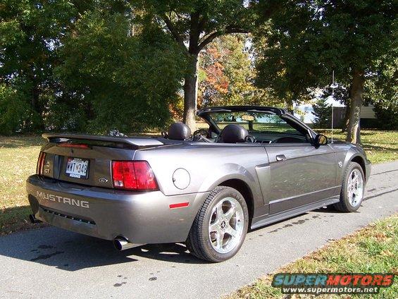 Gray 2004 Ford Mustang convertible rear view with GT badging