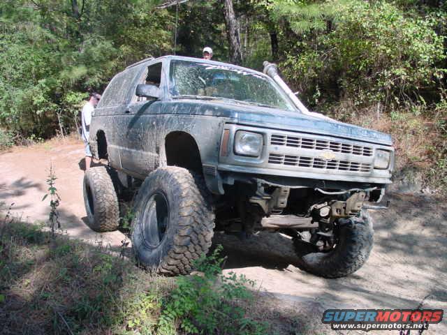Blue 1992 Chevrolet S10 off-road SUV with large tires and snorkel