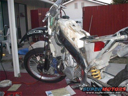 web-im001451.jpg Jimmys bike with the frame all polished up like a mirror. 