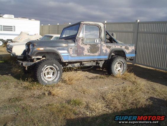 picture-045.jpg CJ8 with no engine tranny in the bed and T case in the cab.