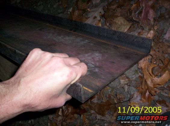 Metal part with hand, 11/09/2005 Supermotors.net watermark