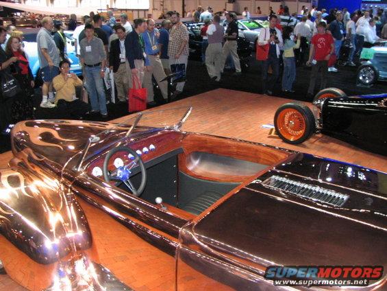 Copper hot rod with wood interior and orange wheels