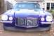 1970 Chevrolet Camaro - This purple 1970 Chevrolet Camaro features a distinctive front grille and a prominent hood scoop.