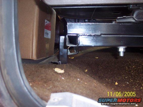 Seat bracket with a cardboard box in the background