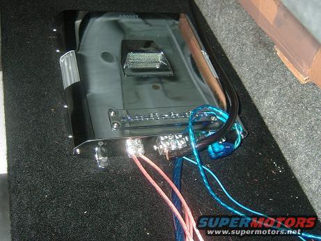 Car amplifier with pink and blue wiring connected