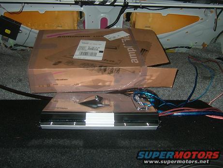 Car amplifier and box in trunk with wiring