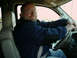 2002 Ford F-250 - Man driving a truck interior. Watermark reads SUPERMOTORS.