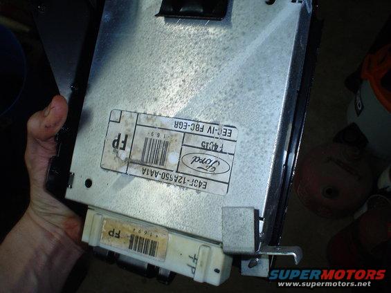Ford electronic control unit with labels showing part numbers and 'EEC-IV FBC-EGR'