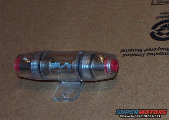 clear inline fuse holder with red end caps and a metal fuse element inside