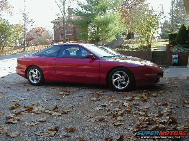 Red 1994 Ford Probe 3q-front view