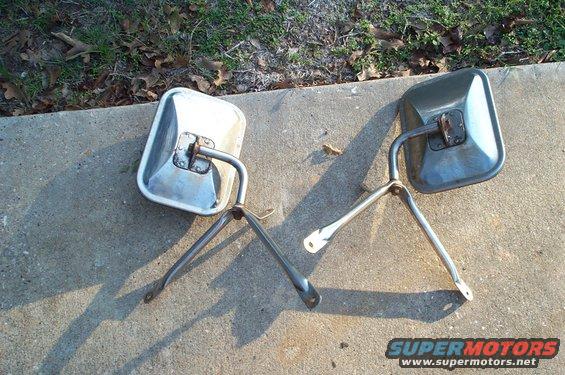 Two truck side mirrors with chrome arms and square housings, one silver, one dark gray