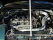 1994 Ford Probe - The engine bay of a 1994 Ford Probe, a V6 engine with custom modifications.