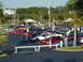 1994 Ford Probe - A gathering of sports cars at an outdoor event, with people milling around.