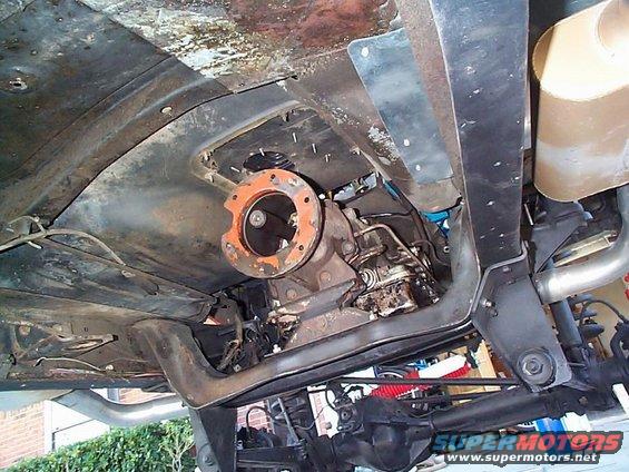 Undercarriage of a vehicle showing the transmission and exhaust system