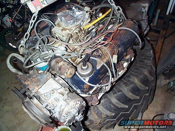 Engine and large tire assembly, viewed from above