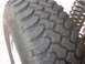 1978 Ford Bronco - A close-up view of a tire and suspension component is visible.