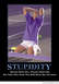 2001 Ford Crown Victoria - A dejected tennis player kneels on the court with a ball nearby, illustrating the concept of 'Stupidity'.