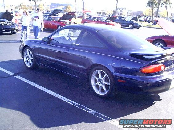 1995 Ford Probe parked in a lot with other cars