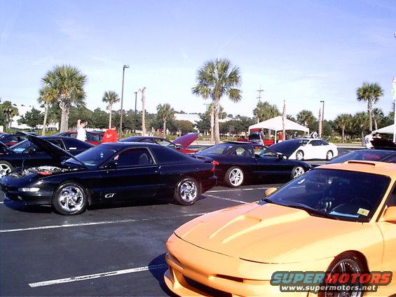 Black 1995 Ford Probe GT side view with hood open