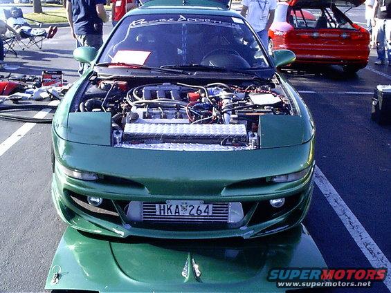 Green 1995 Ford Probe front view with hood open, showing engine and intercooler. License plate HKA 264