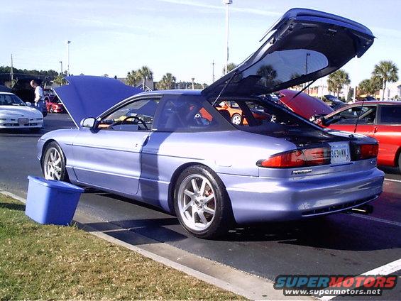 1995 Ford Probe rear quarter view with hood and trunk open