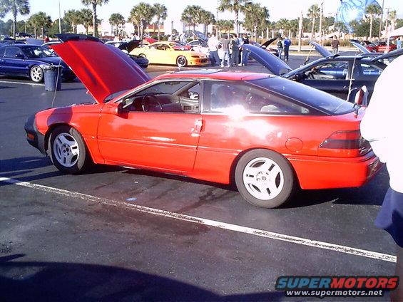 Red 1995 Ford Probe 3q-front view with hood open