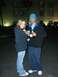 1996 Ford Probe - Couple holding drinks in front of a hotel at night.