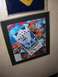 1996 Ford Probe - A framed poster for Myrtle Madness, dated November 2004, Planet Hollywood branding.