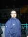 1996 Ford Probe - A man wearing a blue Puma jacket and glasses is pictured outdoors at night.
