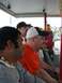 1996 Ford Probe - Spectators observe a race from a viewing area, with a go-kart track in the distance.
