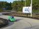 1996 Ford Probe - Person driving a go-kart on a track, with a sign for 'Broadway at the Beach' in the background.