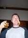 1996 Ford Probe - Man with a drink in his hand, smiling at the camera.