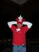 1996 Ford Probe - A man proudly displays his Canadian spirit with a maple leaf hat and t-shirt, hands on his head.