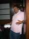 1996 Ford Probe - A man smiles while holding a white takeout container and resting his hand on his stomach.
