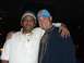 1996 Ford Probe - Two men smile for a photo, one wearing a blue cap with an Indian flag and the other a white cap.