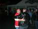 1996 Ford Probe - Two men dancing outside The General Store on Broadway at night.