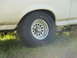 1989 Ford Bronco - Close-up of the wheel and fender of a 1989 Ford Bronco, fitted with Pro Comp Mud Terrain tires.