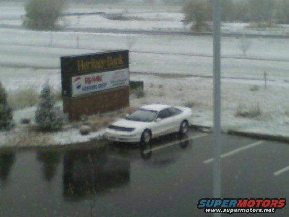 White 1996 Ford Probe parked in a snowy lot