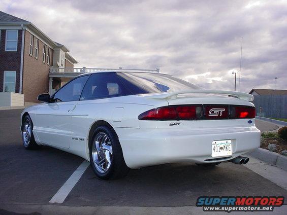 White 1996 Ford Probe GT parked, rear view showing spoiler and GT badge