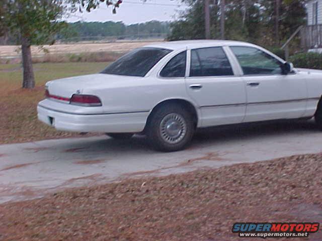White sedan, side view