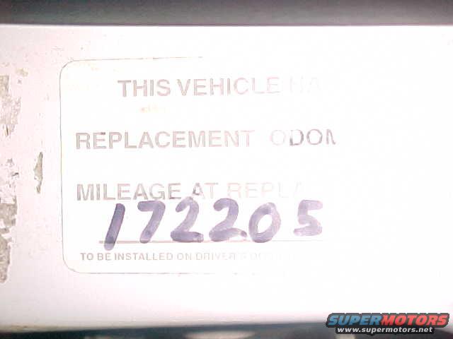 Replacement odometer sticker showing 172205 miles