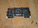 1994 Ford Bronco - Instrument cluster from a 1994 Ford Bronco, gauges for speed, RPM, fuel, and temperature.