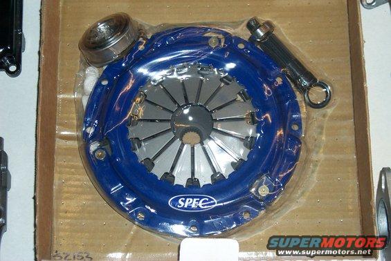 Blue clutch pressure plate with silver disc and pilot bearing in plastic packaging