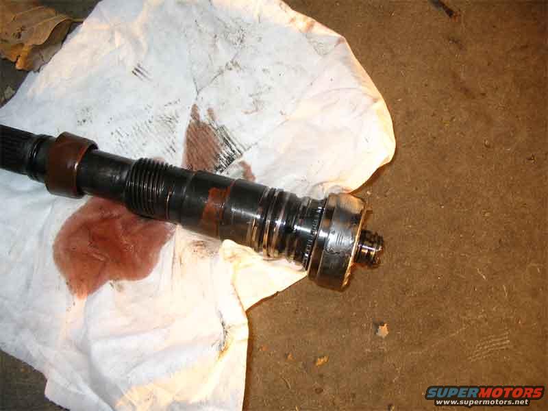 Thats the shaft that was hanging down from the trans. Its not supposed to come off like that. :)