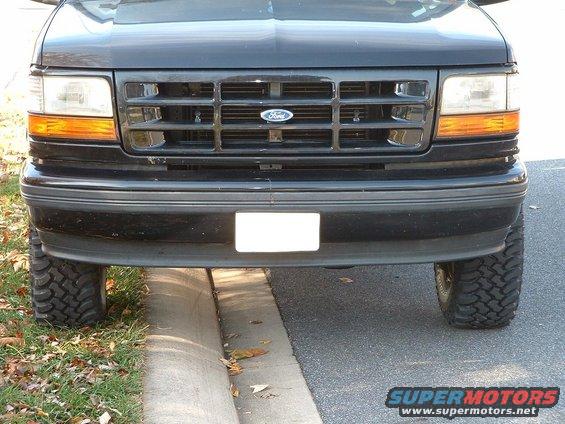 Front view of a black 1994 Ford Bronco with a prominent grille and headlights