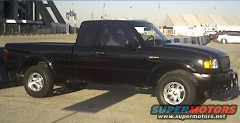 Black 2002 Ford Ranger pickup truck, driver side 3/4 front view
