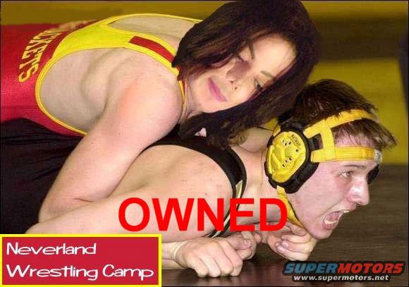 Wrestling match with "OWNED" text overlay and "Neverland Wrestling Camp" logo
