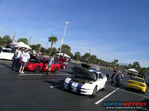 1993 Ford Probe and other cars at a car show